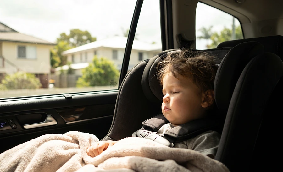 Ceramic window tint providing UV protection for children in a family vehicle